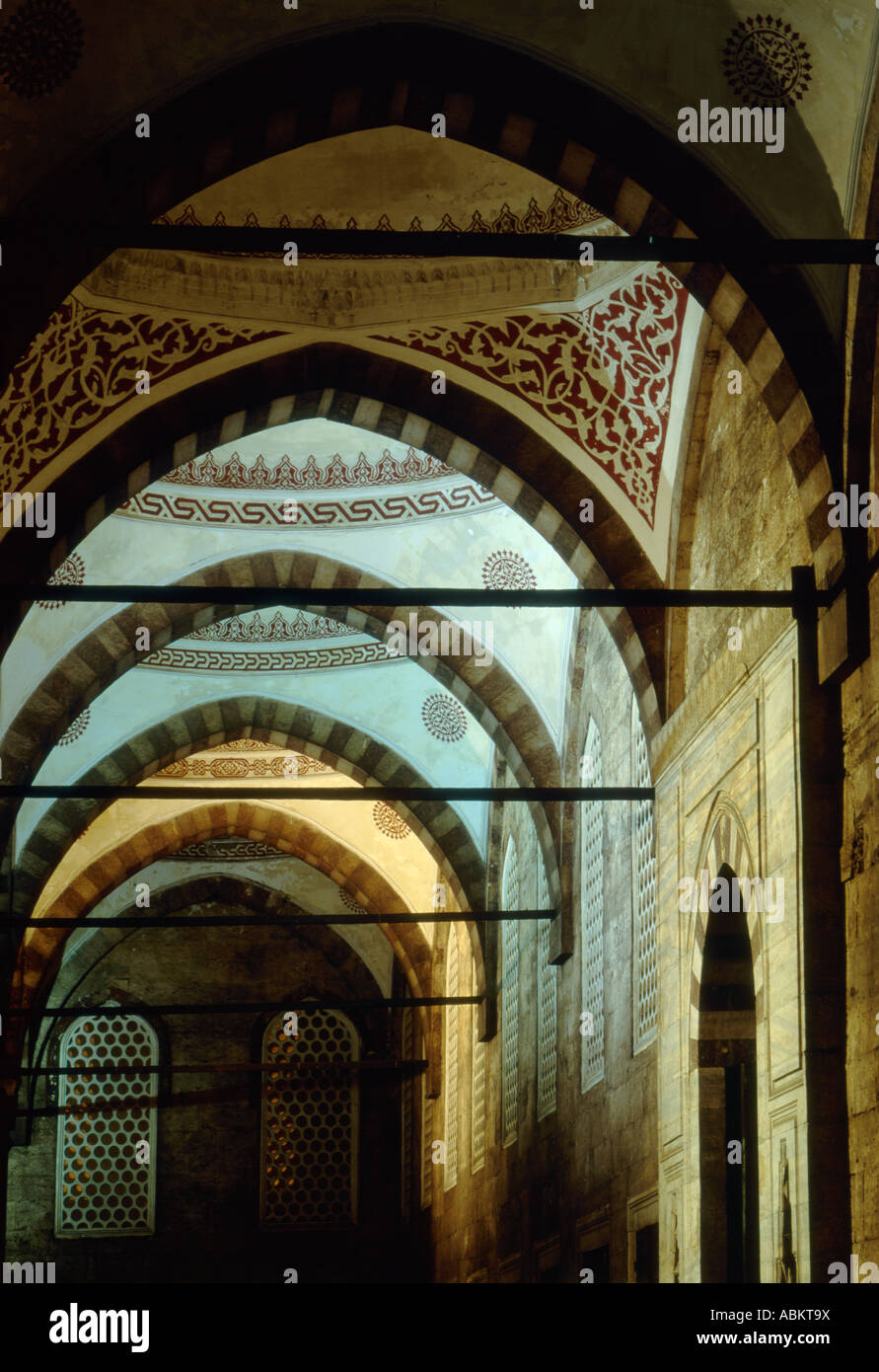 Receding arches in courtyard of the blue Mosque, Turkey at night Stock Photo