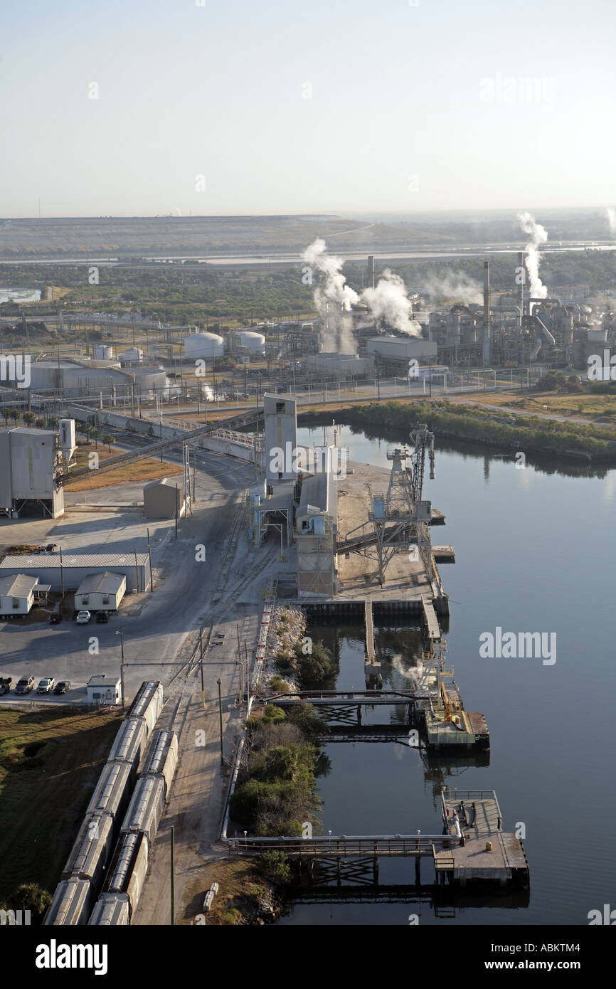 Aerial photo of heavy industrial factory plant on Alafia River Gibsonton Tampa Bay South Channel Florida Stock Photo