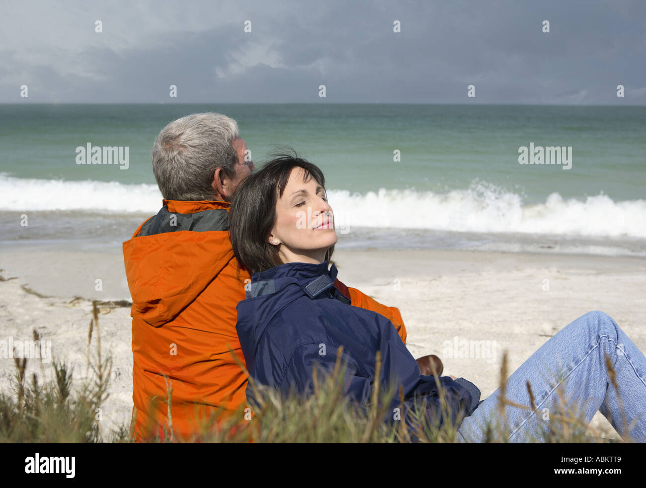 Sitting woman wearing navy hi-res stock photography and images - Alamy