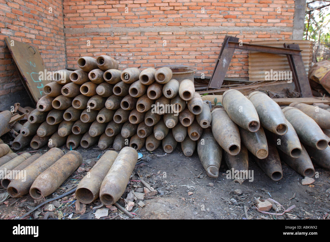 Defused mortar shells from the Vietnam War lie in a scrap yard in