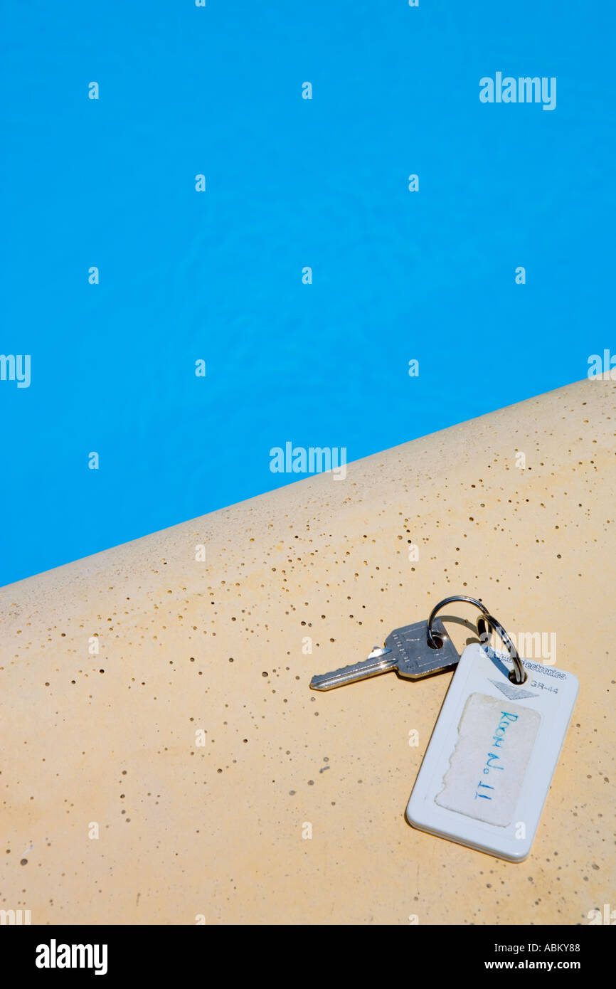 APARTMENT KEY BESIDE A SWIMMING POOL Stock Photo - Alamy