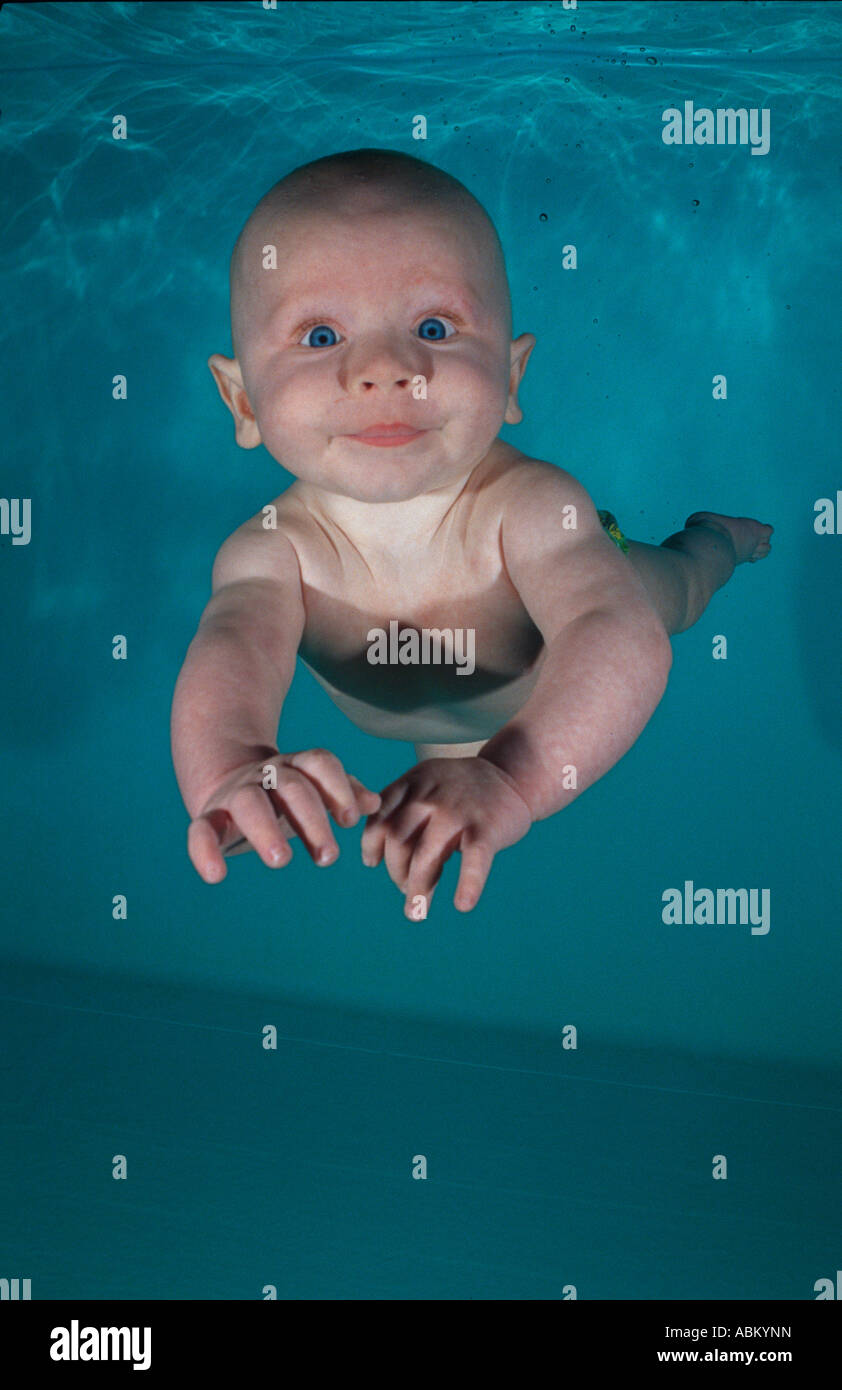 baby diving under water Stock Photo Alamy