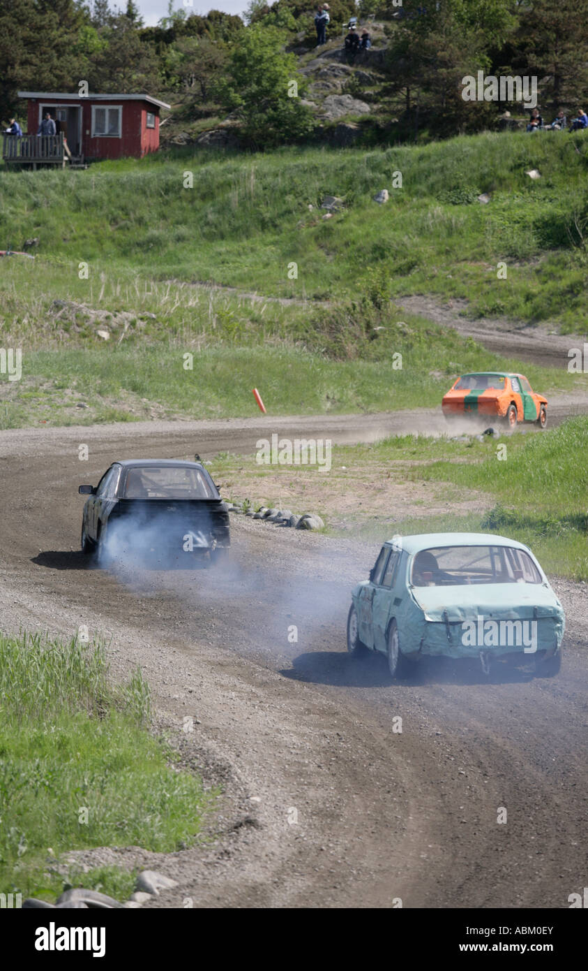 Motorcars in Swedish folk races on gravel tracks of a countryside racecourse in Torslanda Gothenburg Sweden. Stock Photo