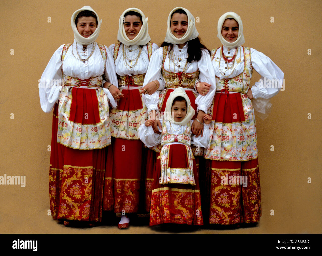 Elaborate traditional costumes are worn by local people at Cavalcata Sarda annual  festival parade in Sassari,Sardinia,Italy Stock Photo