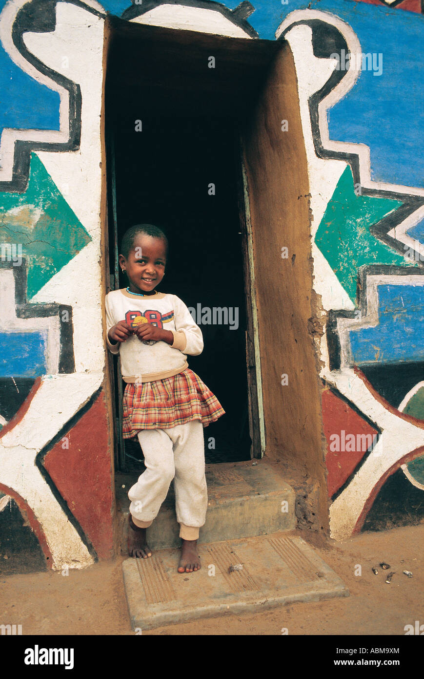 Young Zulu girl in the doorway of her house Mooi River natal Midlands South Africa Stock Photo