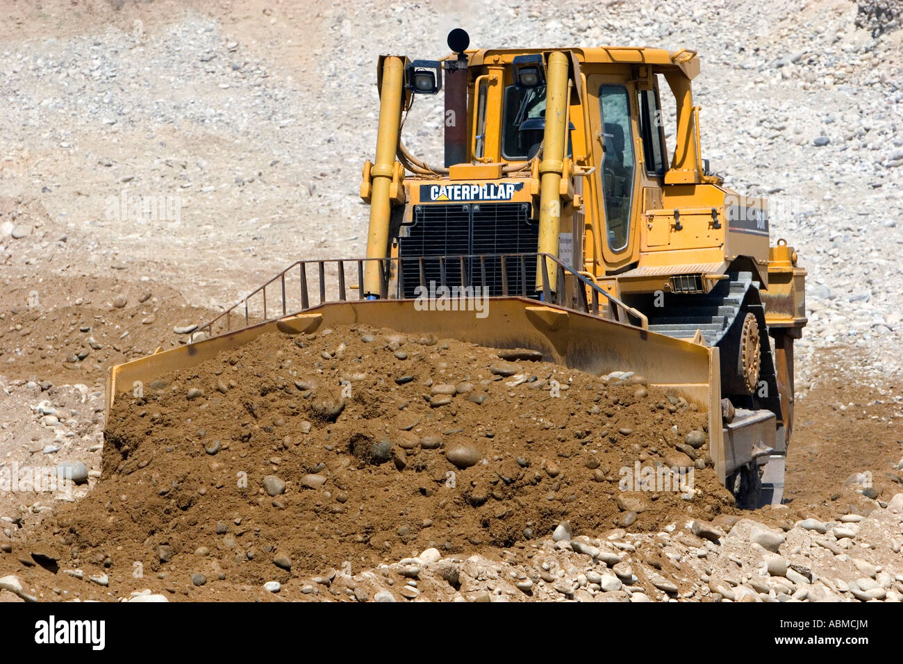 Bulldozer working in a gravel pit near Emmett Idaho Stock Photo