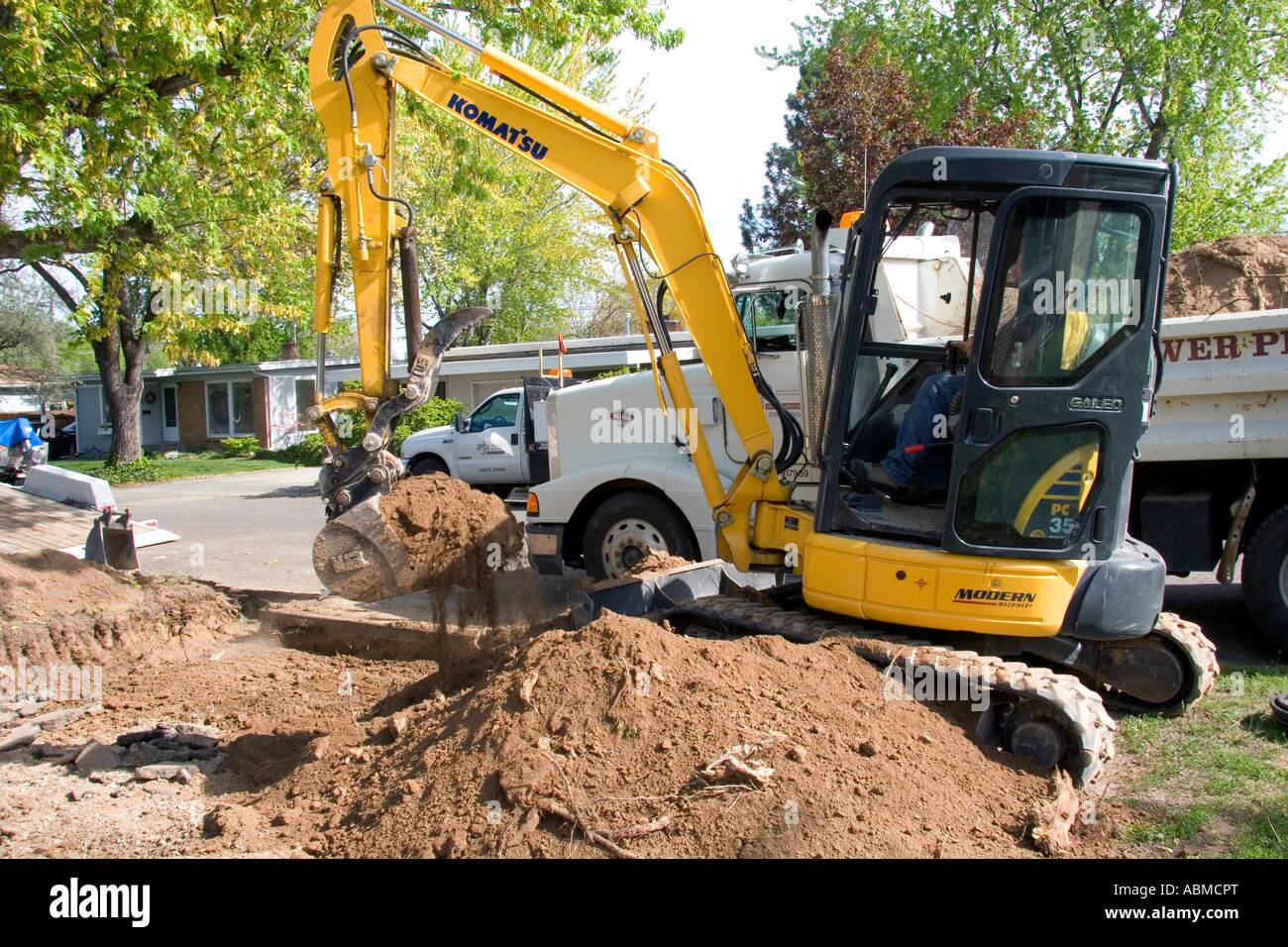 Track mounted backhoe on a construction project in Boise Idaho Stock Photo