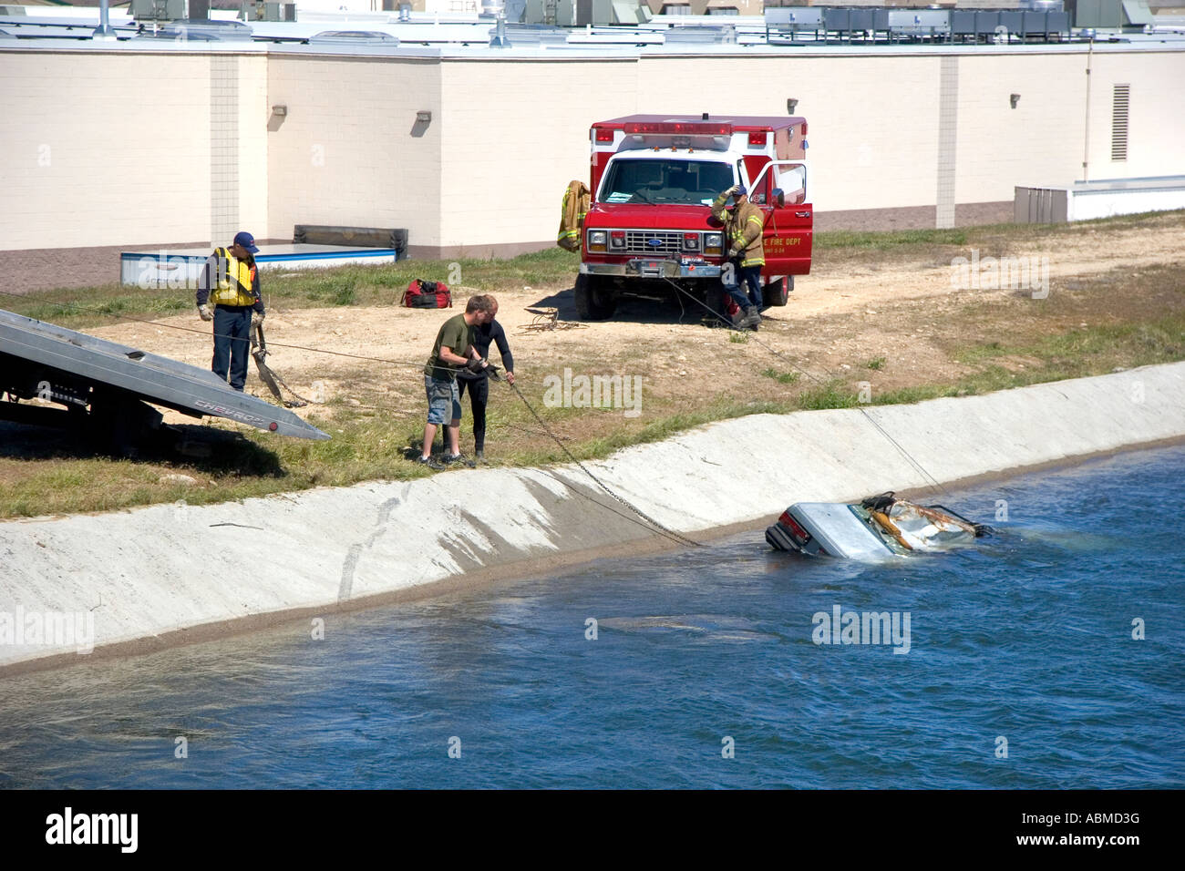 Fire department divers pull a car from a irrigation canal in Boise