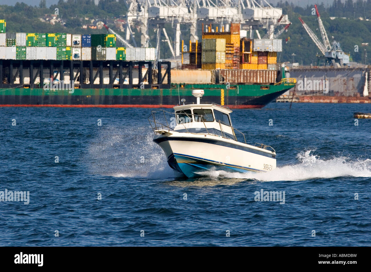 A motorized boat in Elliott Bay at Seattle Washington Stock Photo