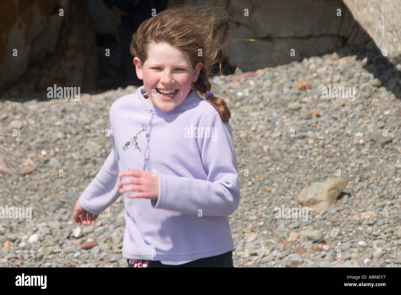 Nine year old girl running hi-res stock photography and images - Alamy