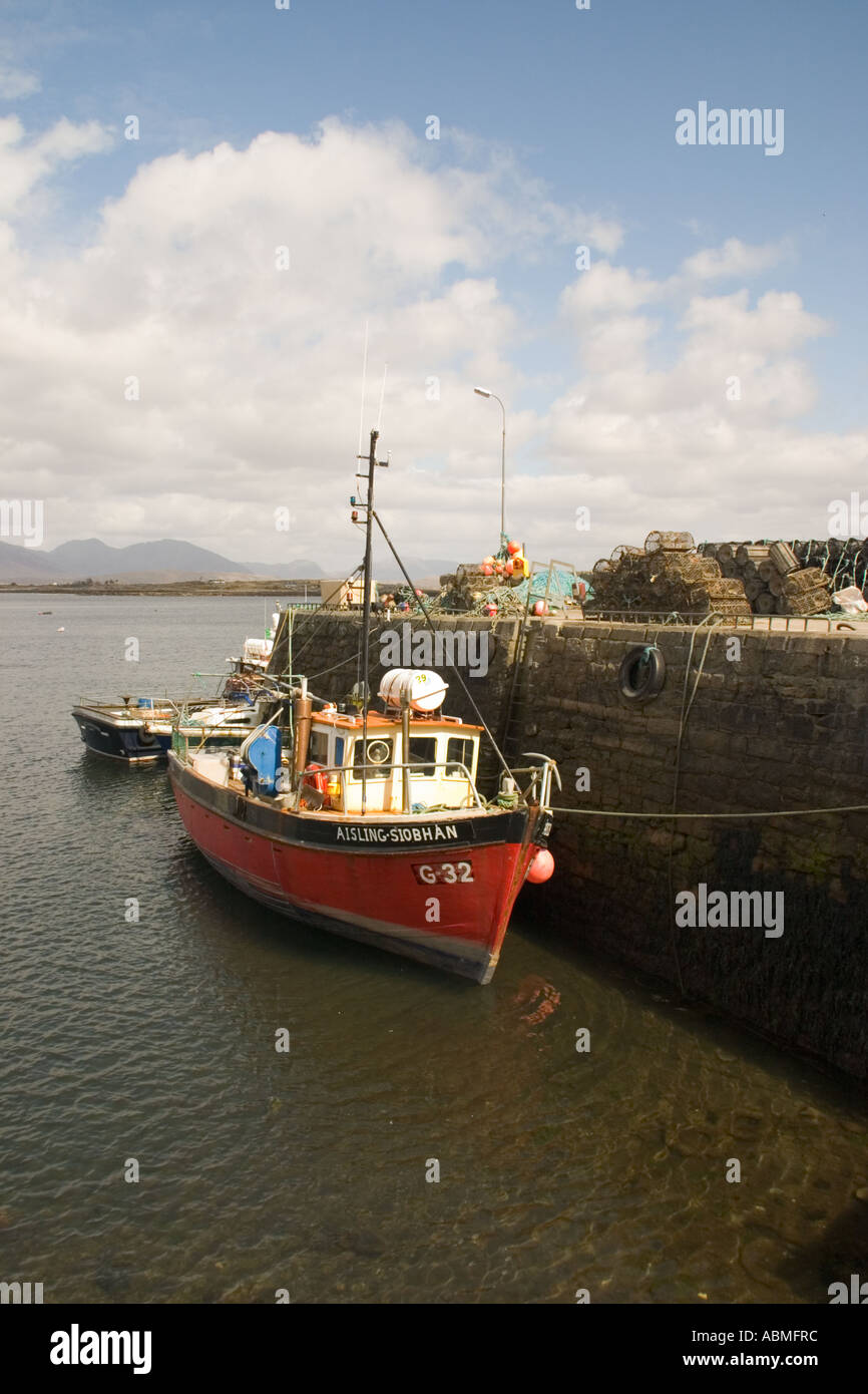 Fishing boat in Roundstone harbour Connemara Ireland Stock Photo