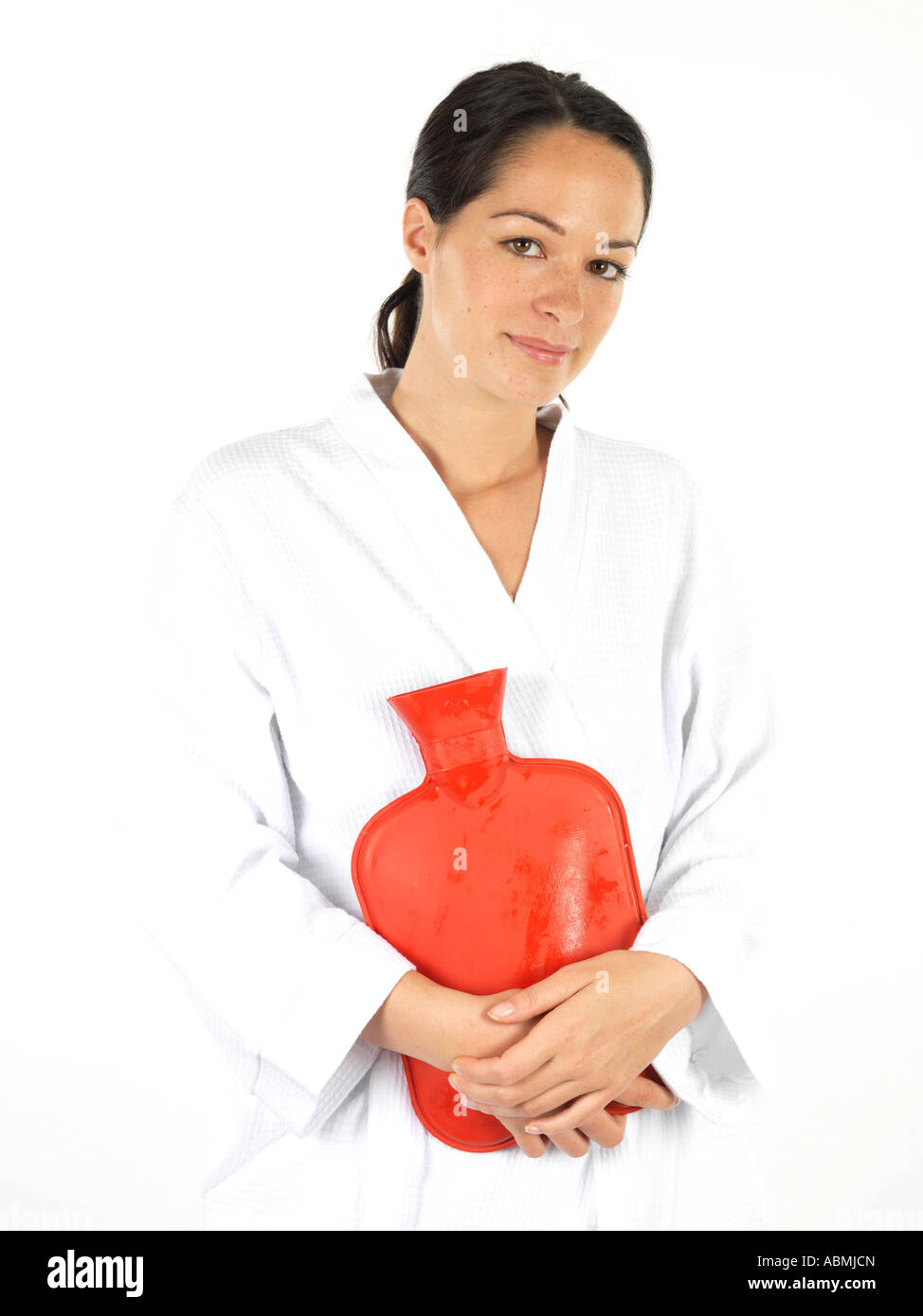 Woman hot water bottle tummy hi-res stock photography and images - Alamy