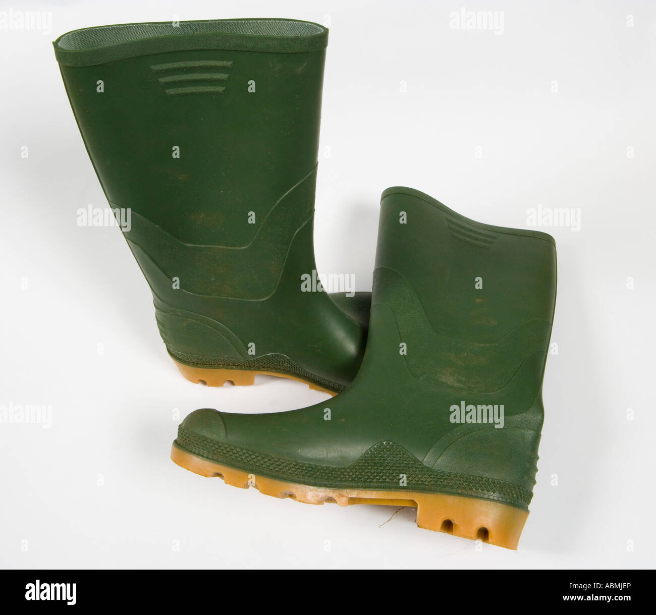 green wellington boot on a white background Stock Photo