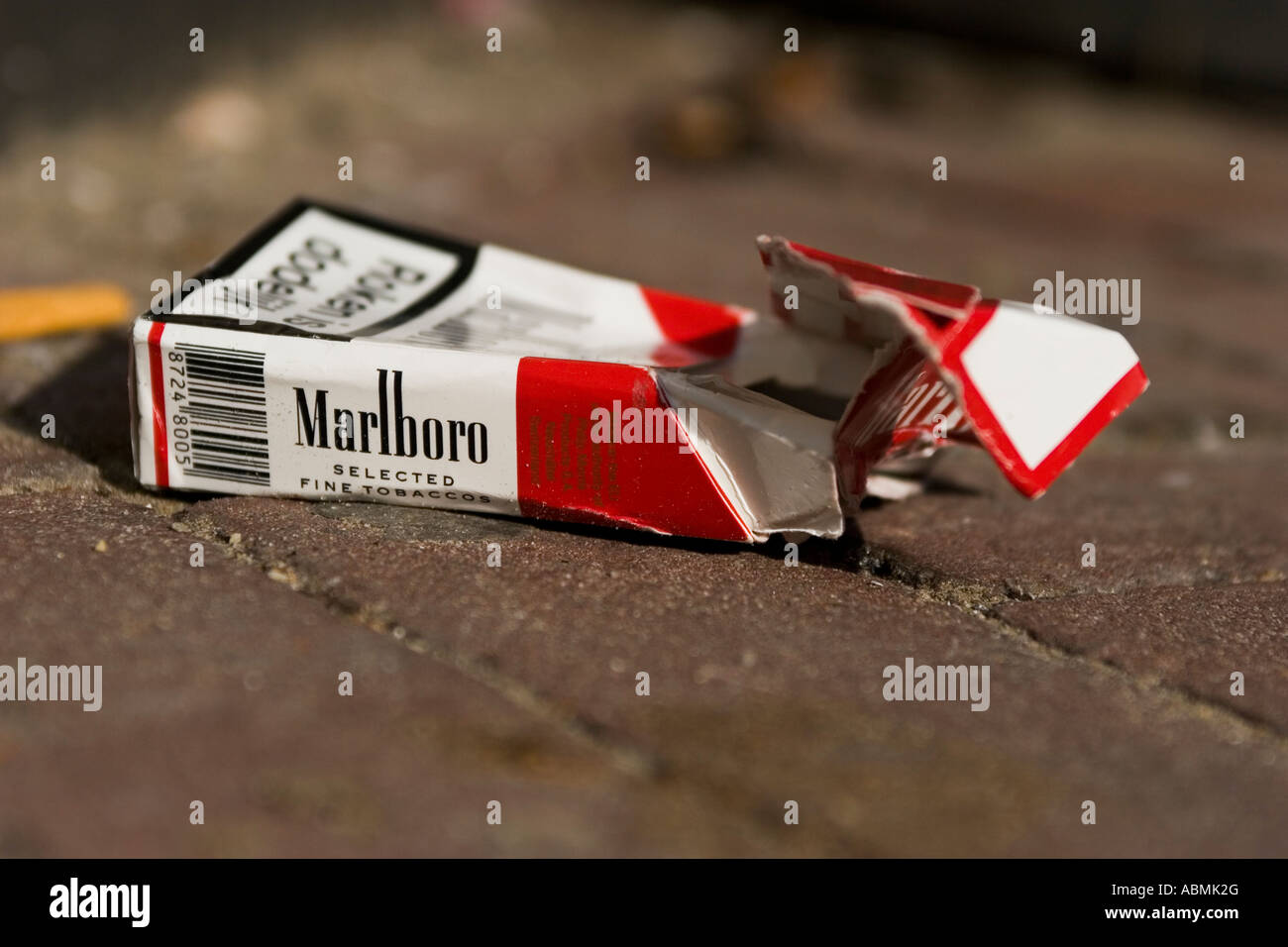 Empty box of Marlboro cigarettes thrown away on the street,wrinkled Stock  Photo