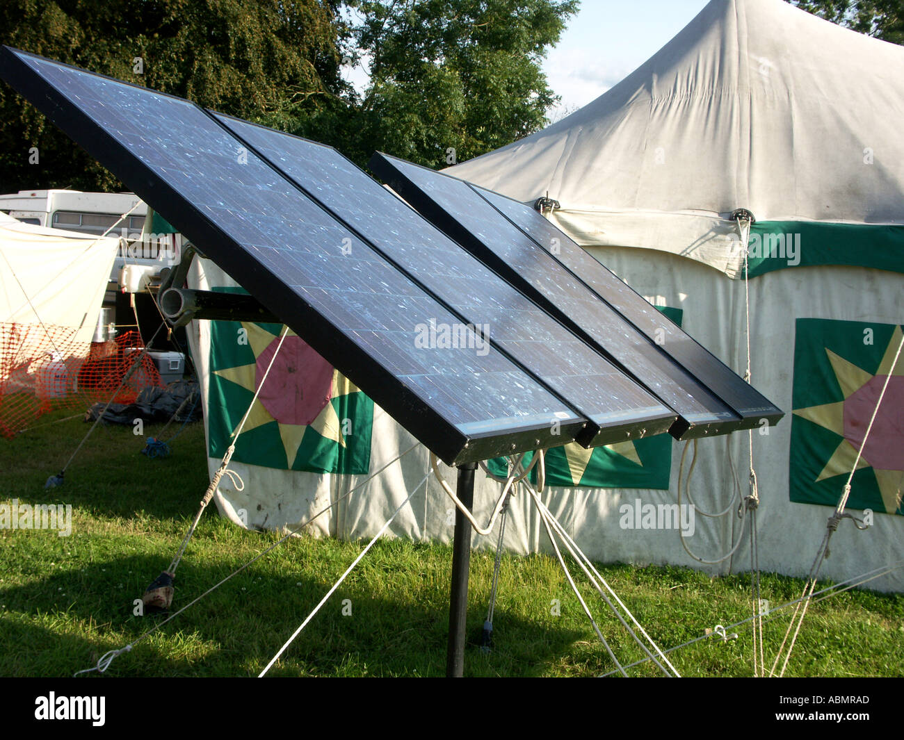 solar panels powering the small world cafe stage at buddhafields festival uk 2005 Stock Photo