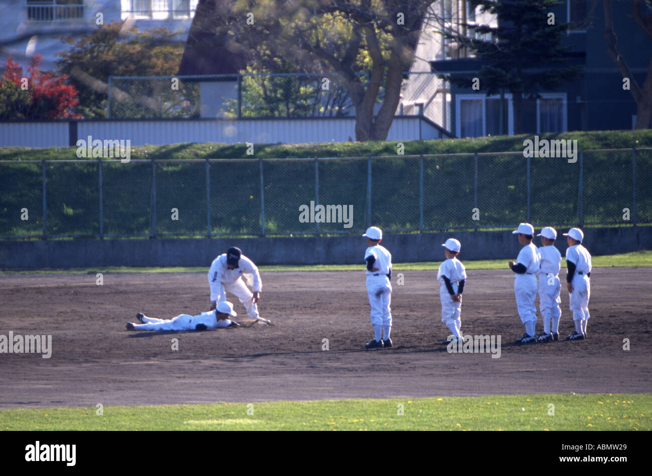 Little league baseball practice Hokkaido Japan Stock Photo