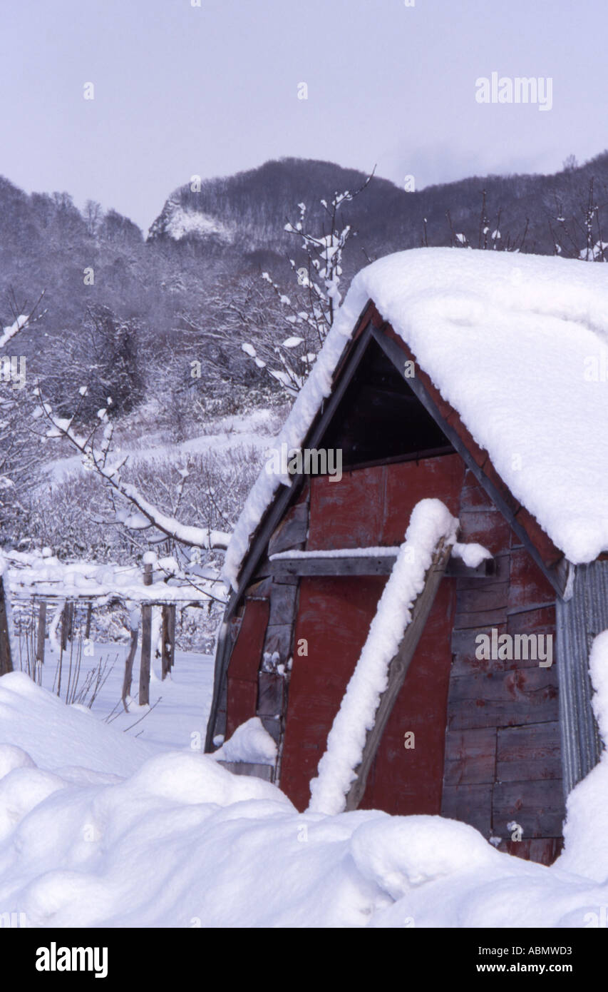 Snow covered hut in Hokkaido Japan Stock Photo