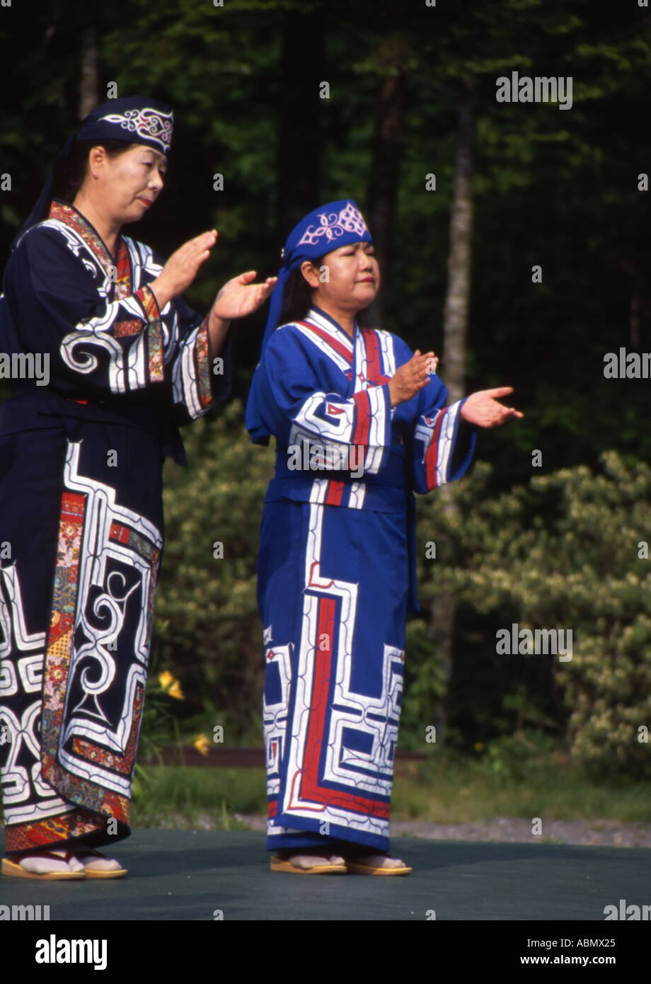 Ainu women in traditional Ainu dress Ainu are the aboriginal people of Hokkaido Japan Stock Photo
