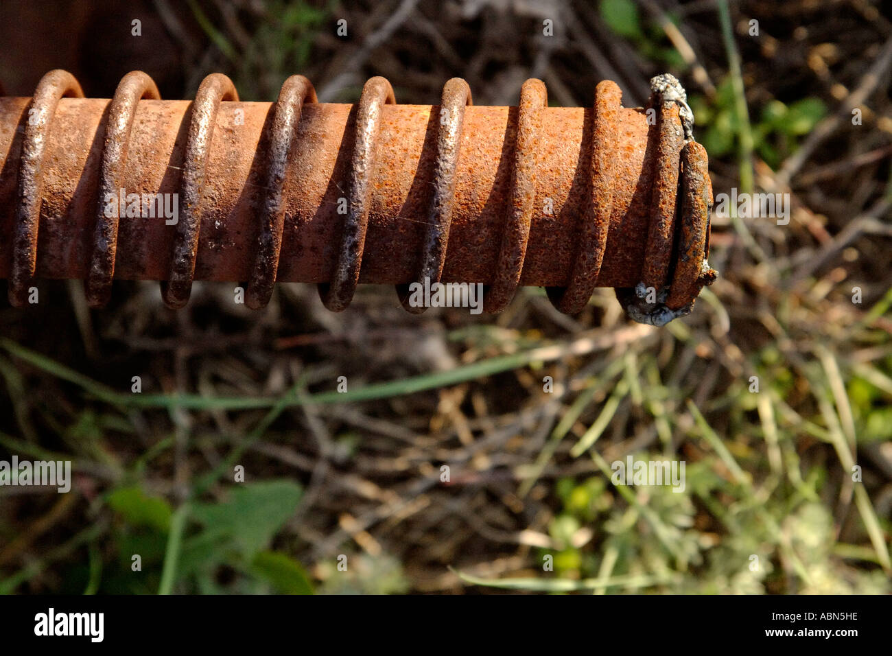 Rusting metal of farming equipment junk in scenic Saskatchewan Canada
