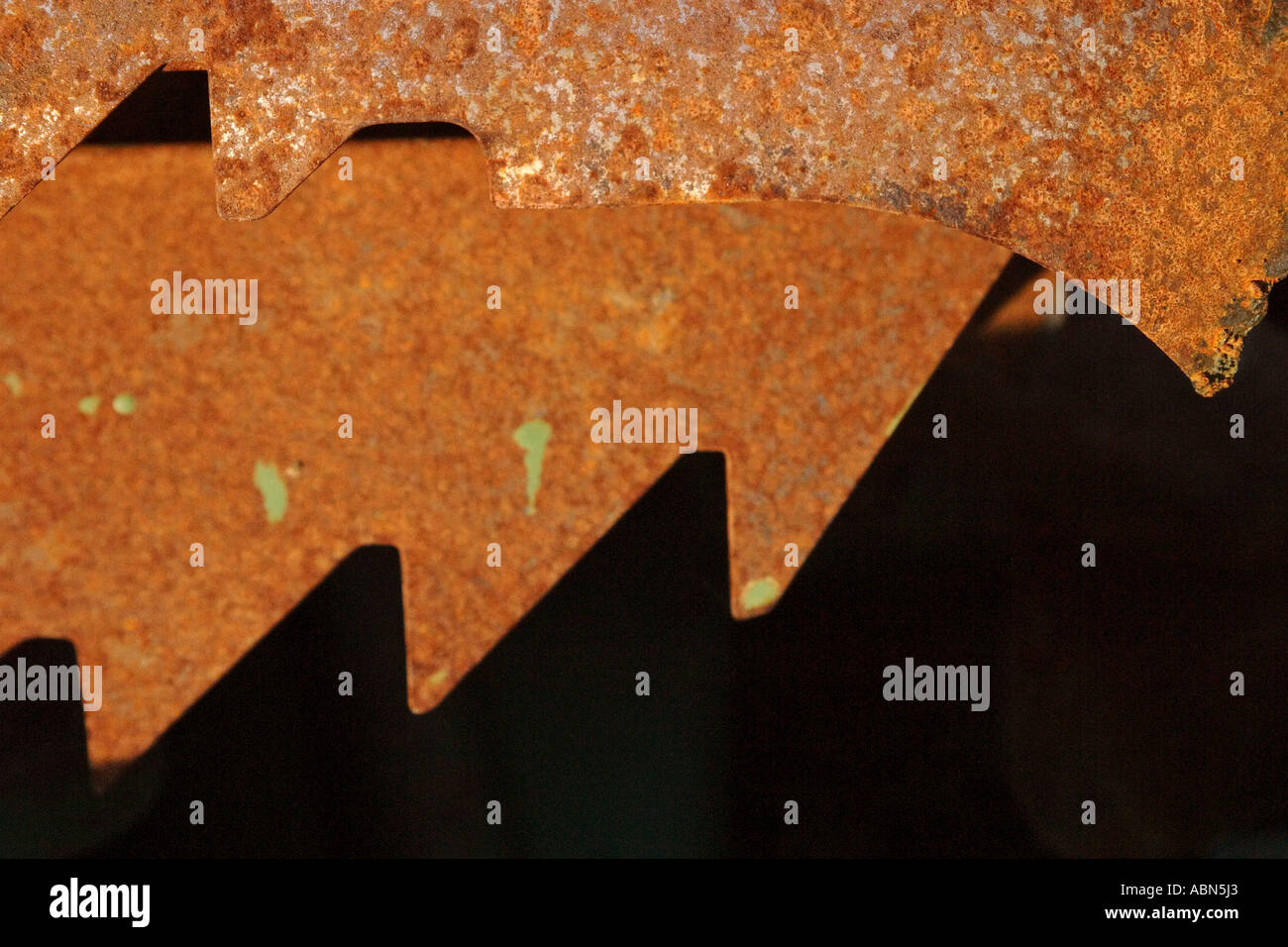 Rusting metal of farming equipment junk in scenic Saskatchewan Canada