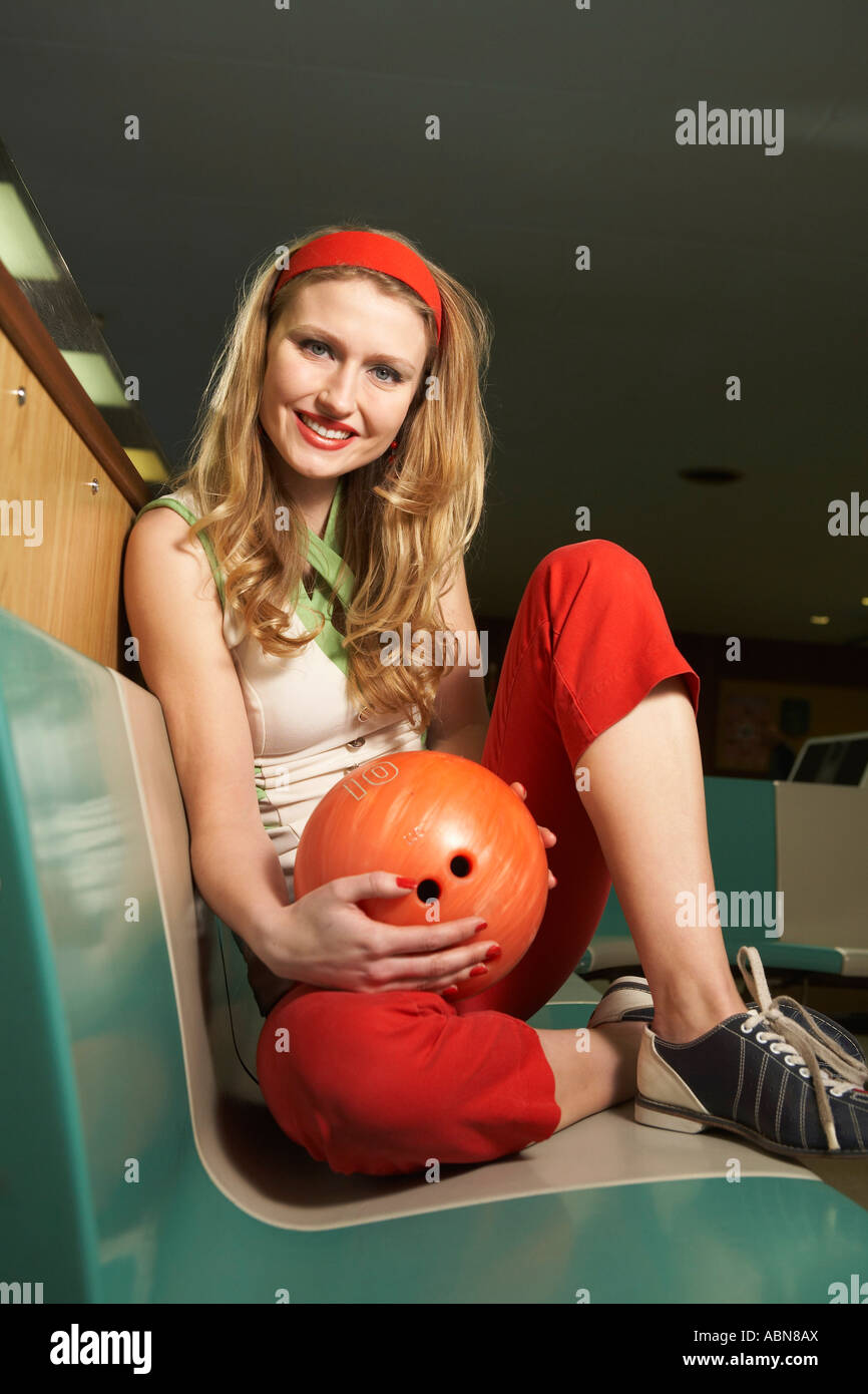 Woman in Bowling Alley Stock Photo