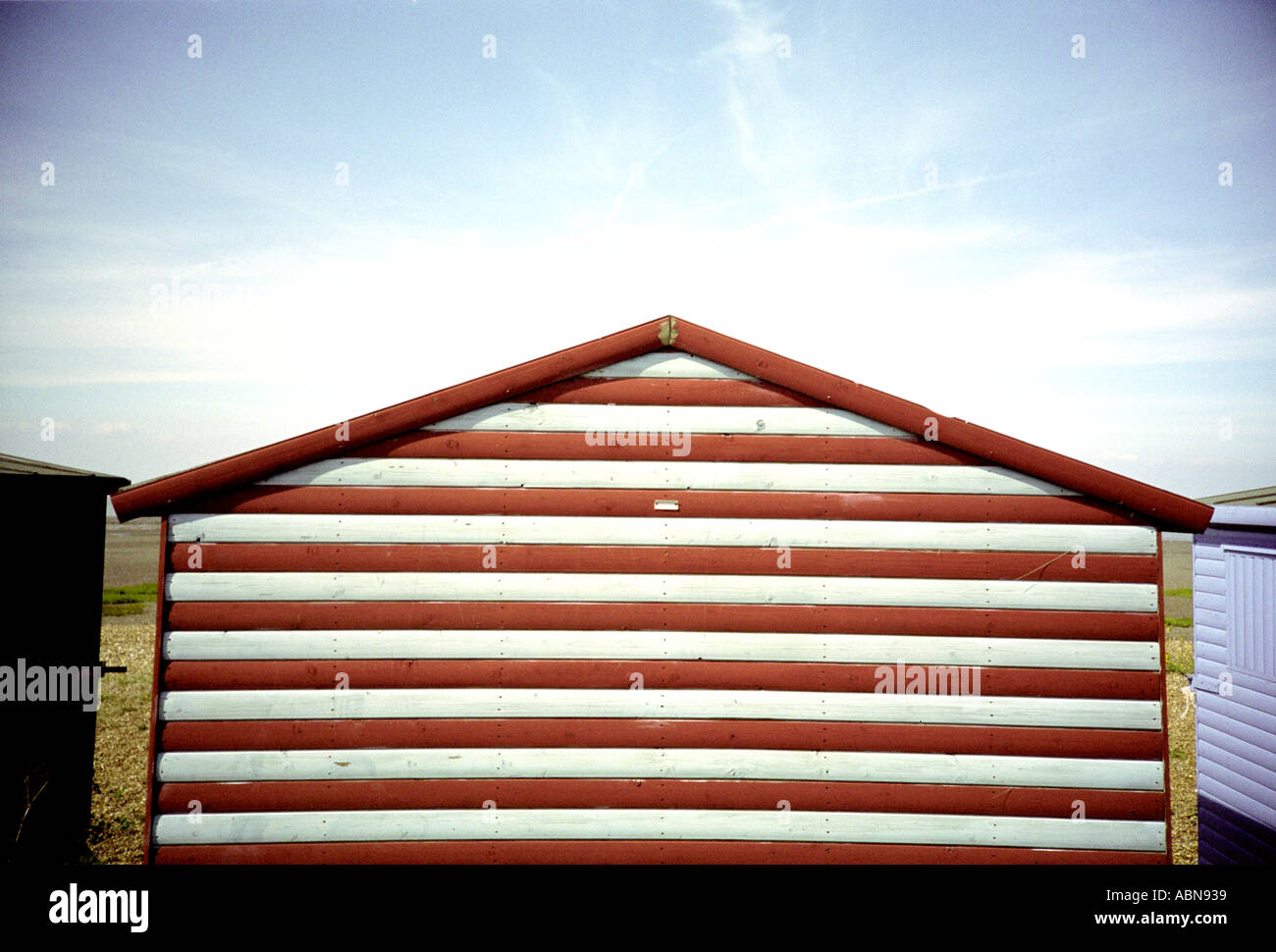 Red white striped beach hut Stock Photo