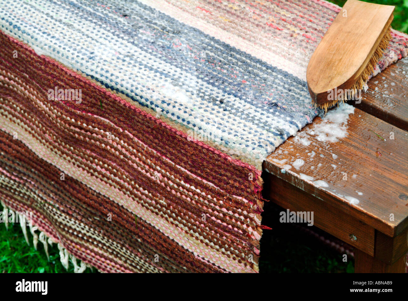 Cleaning an outdoor rug hires stock photography and images Alamy