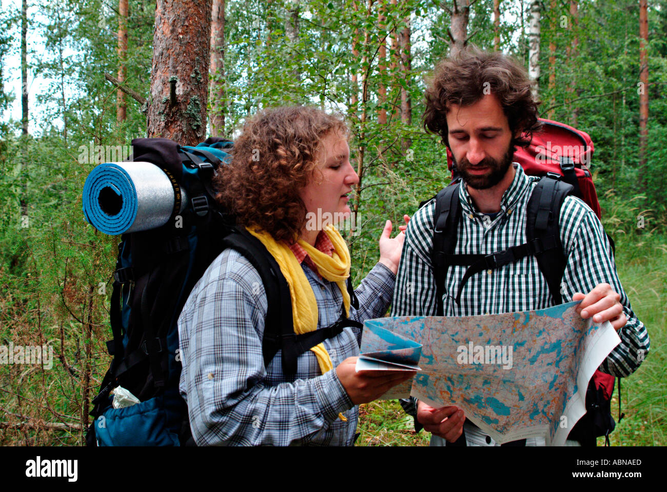 Young hiking couple map hi-res stock photography and images - Alamy