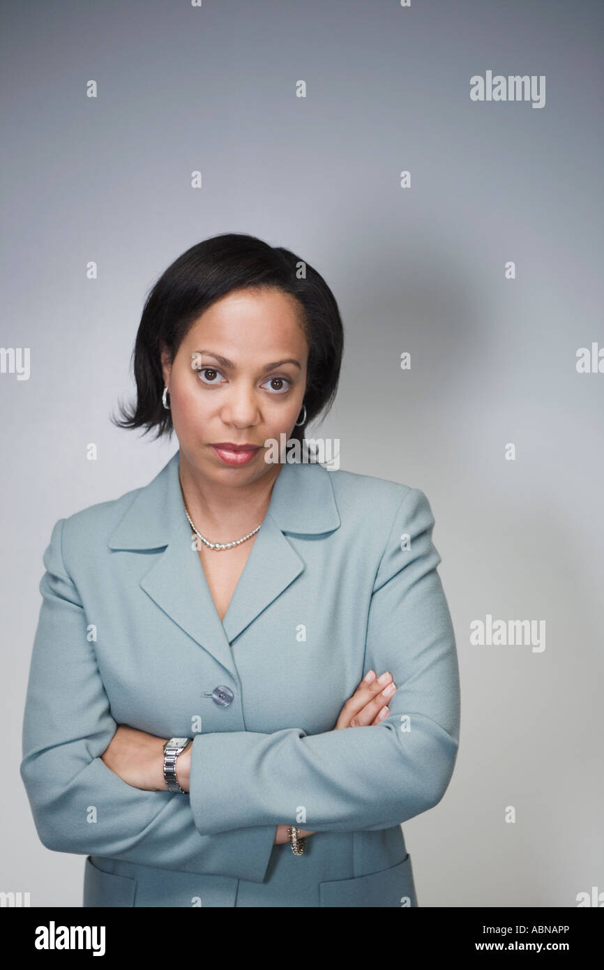 Stern woman arms crossed hi-res stock photography and images - Alamy