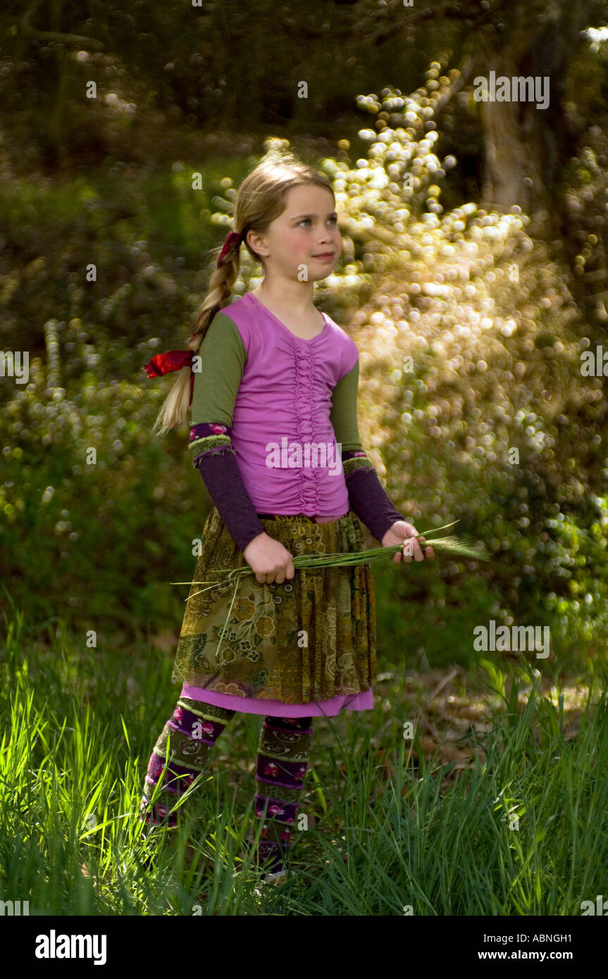 Portrait of a young girl outside Stock Photo - Alamy