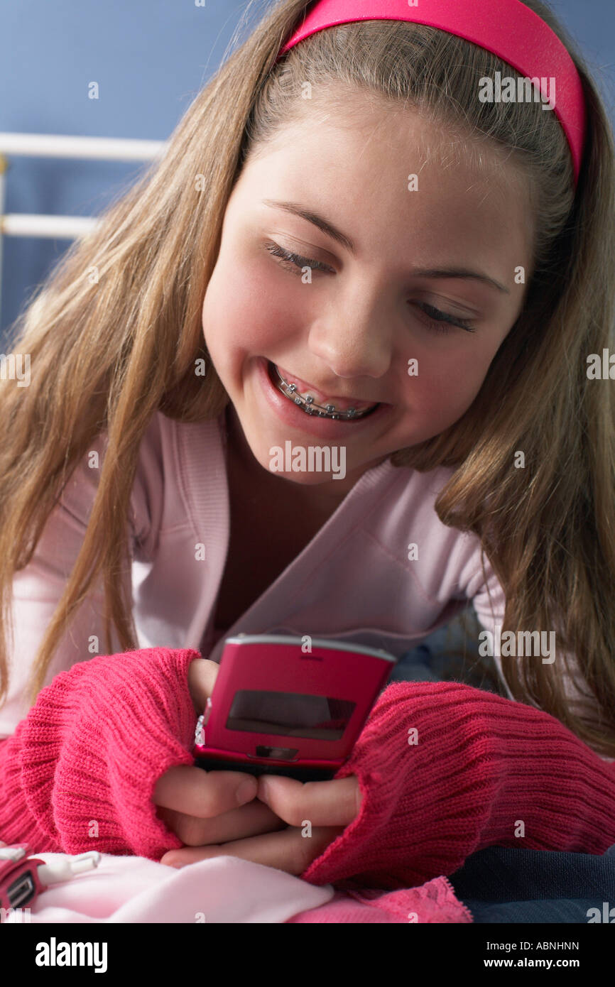 Preteen girl lying on stomach hi-res stock photography and images - Alamy