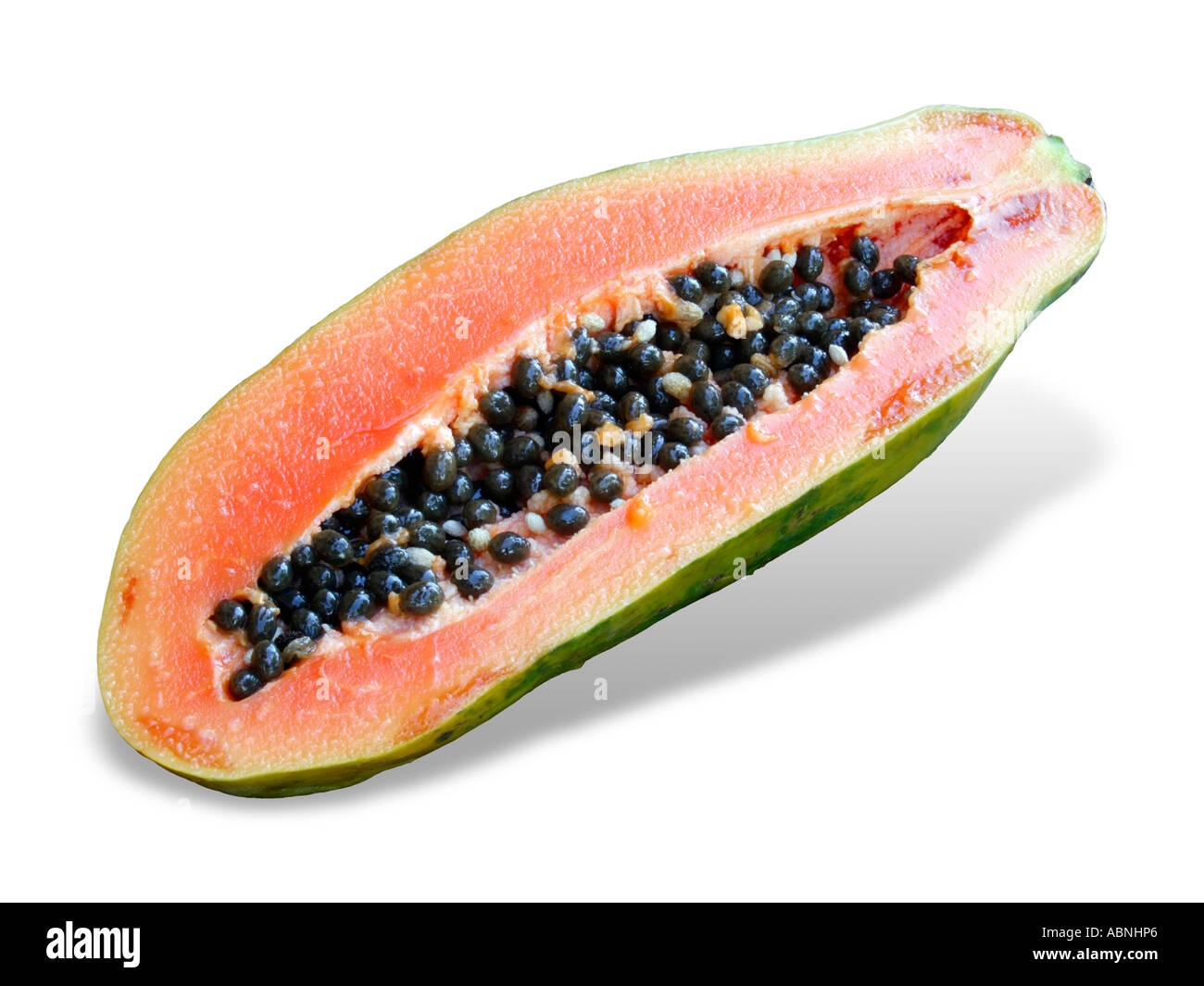 Papaya cut in half on a white background with a shadow Stock Photo Alamy
