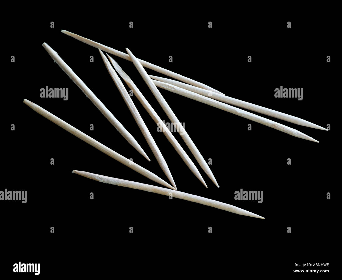 random scatter toothpicks on a black background Stock Photo