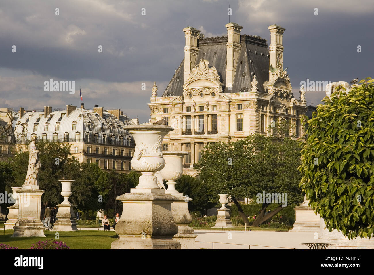 Jardin des Tuileries sculpture garden with the Musee du Louvre in back Paris France Stock Photo