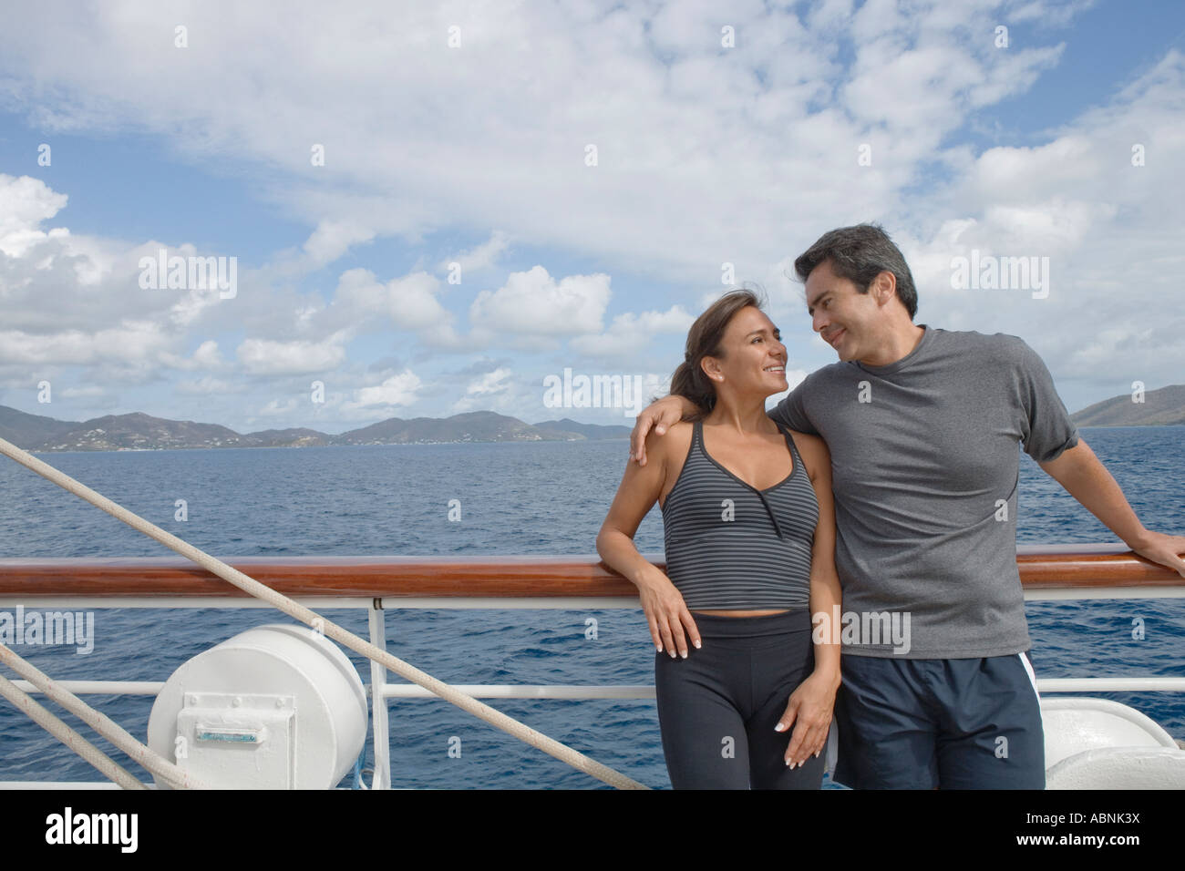 Couple leaning on boat deck hi-res stock photography and images - Alamy
