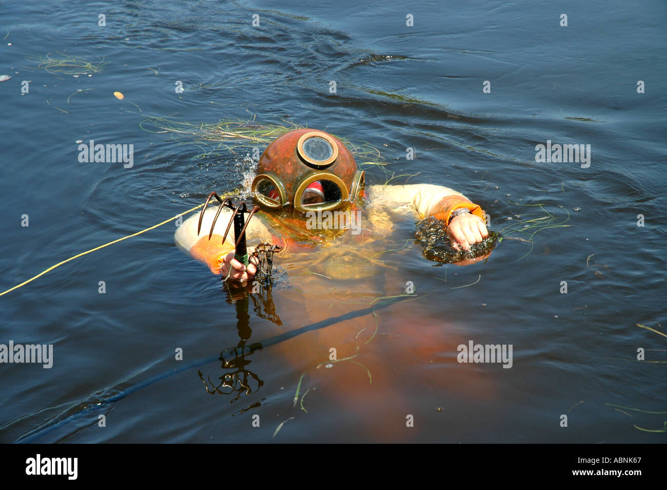 Tarpon Springs Florida sponge diving demonstration diver floating on