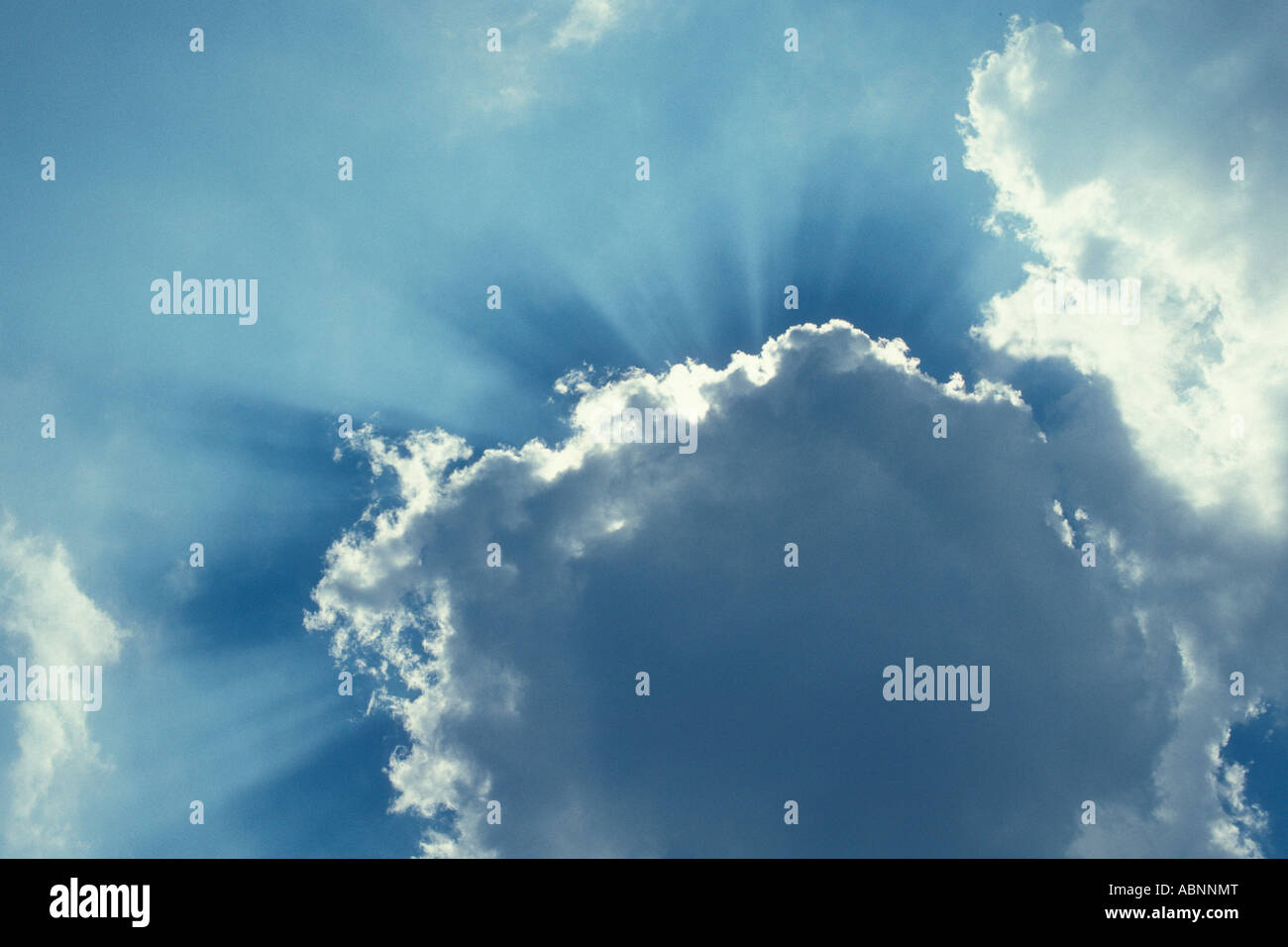 sunburst with clouds Stock Photo - Alamy