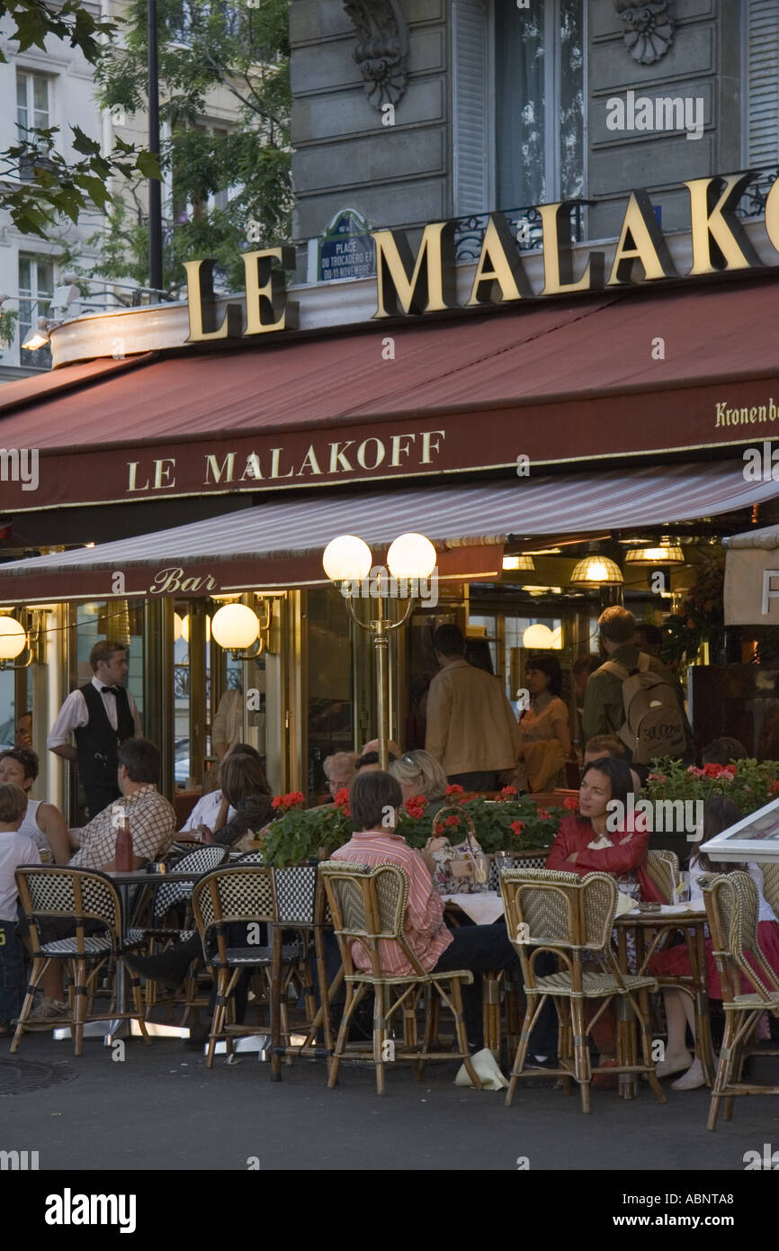 People eating at Le Malakoff restaurant at Place du Trocadero Paris France Stock Photo