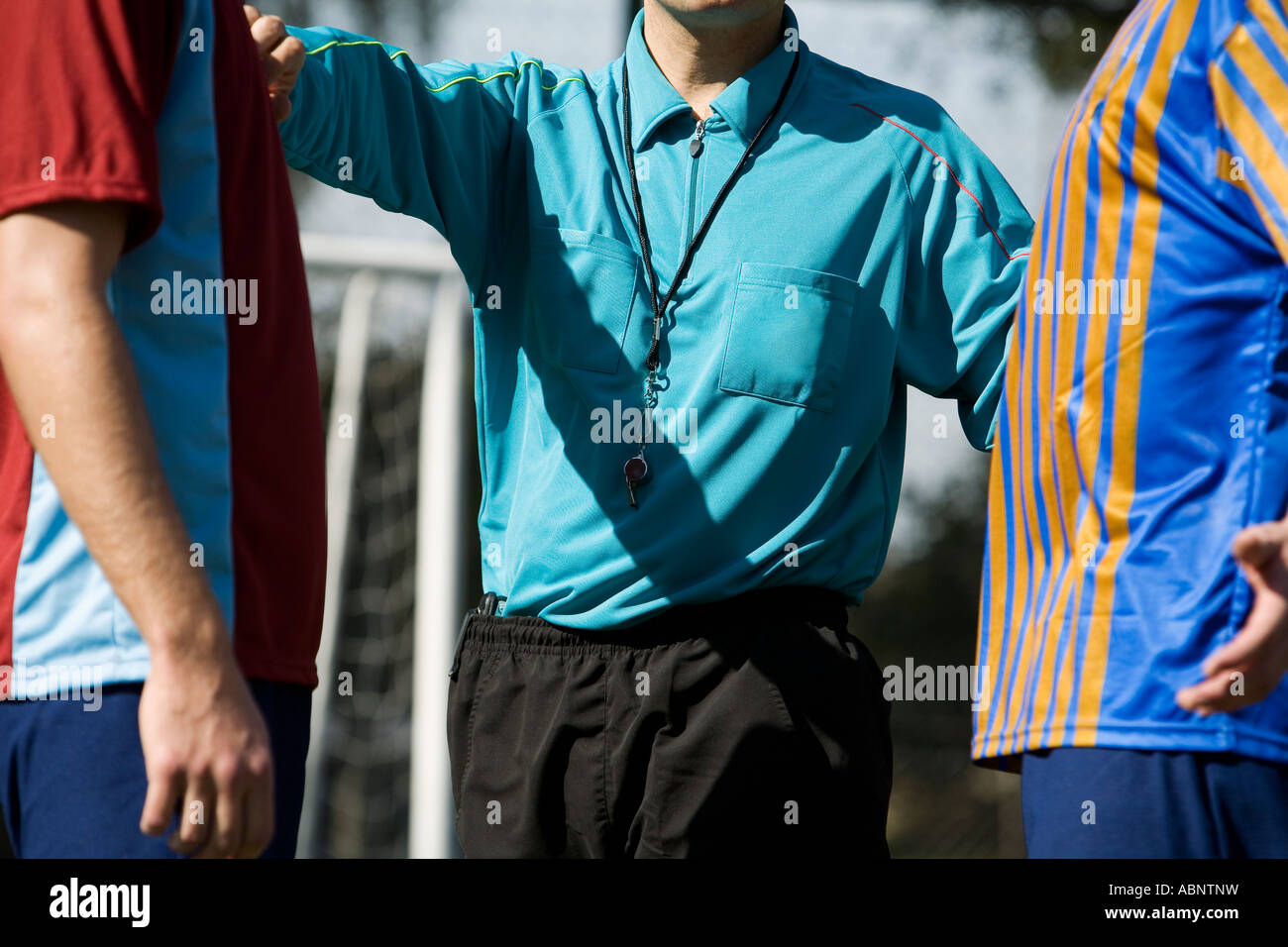 Players Arguing With Referee High Resolution Stock Photography and