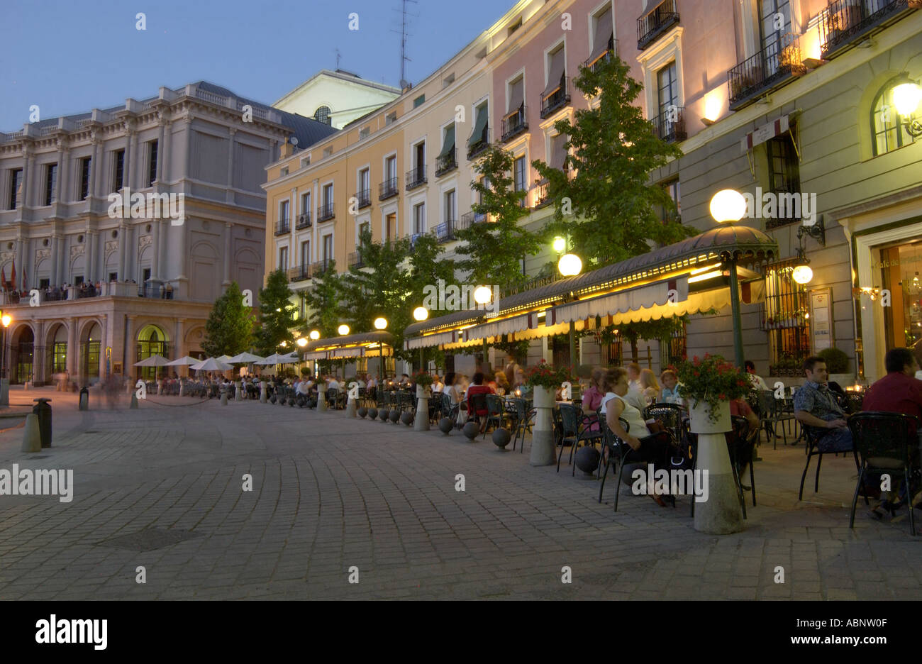 Pavement restaurant at twilight in the Plaza de Oriente, Madrid, Spain Stock Photo