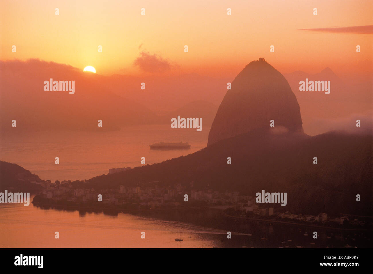 Above Pao de Acucar (Sugar Loaf) and Botofago Bay in Rio De Janeiro at sunrise Stock Photo