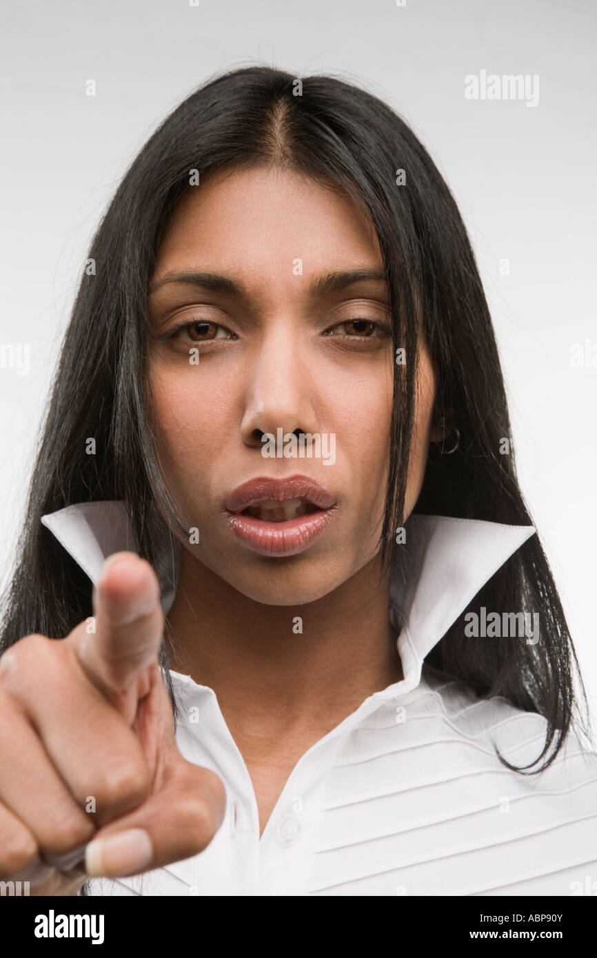 Indian serious woman pointing hi-res stock photography and images - Alamy