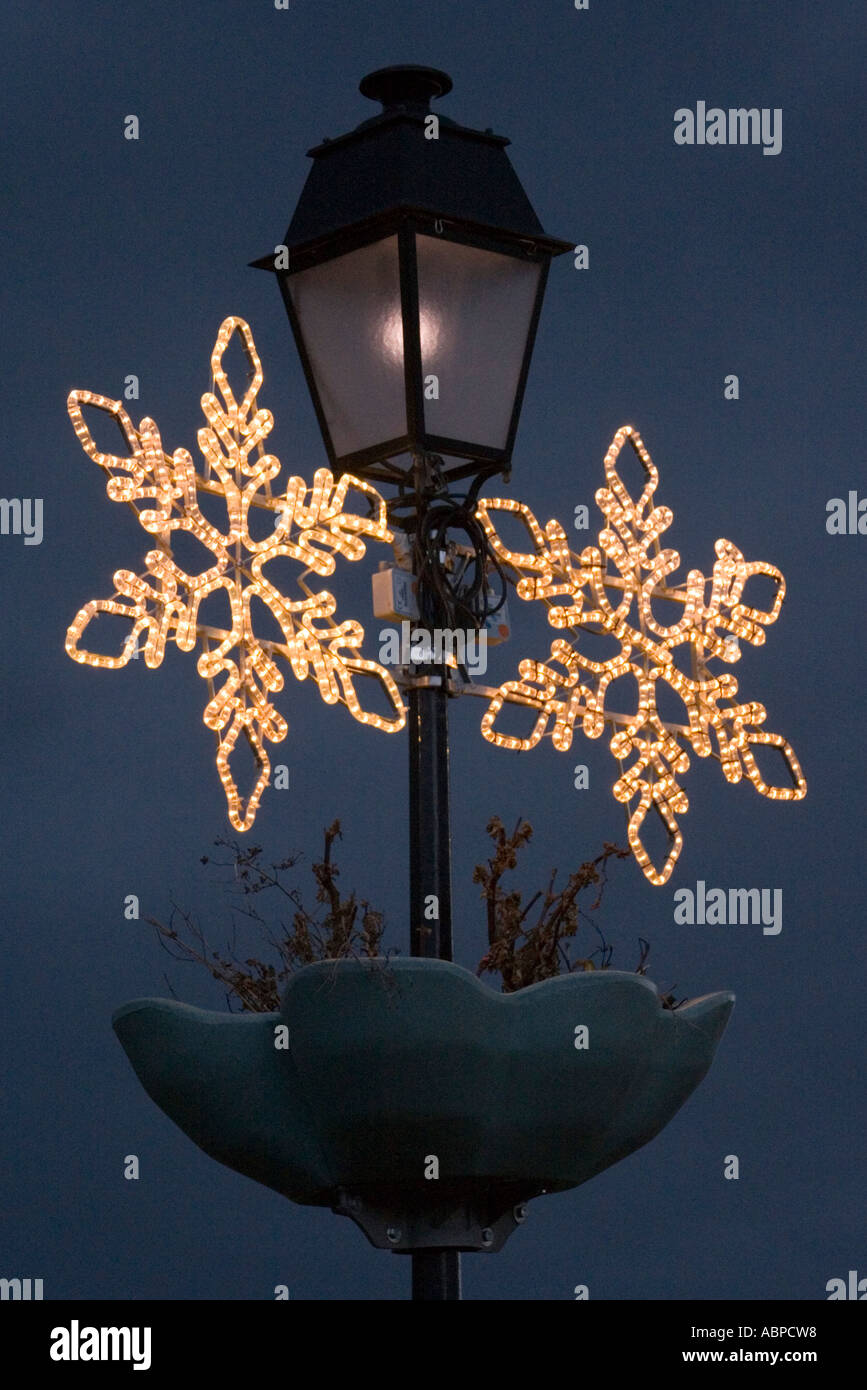 Street Lamp With Christmas Decoration In Bize France Stock Photo