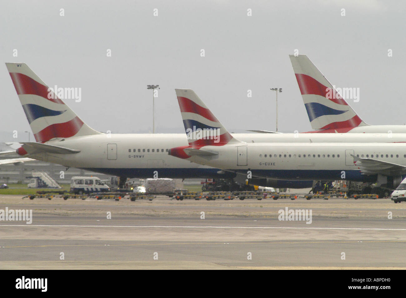 British Airways airliners on the runway at Heathrow Airport London Picture by Andrew Hasson May 18th 2006 Stock Photo
