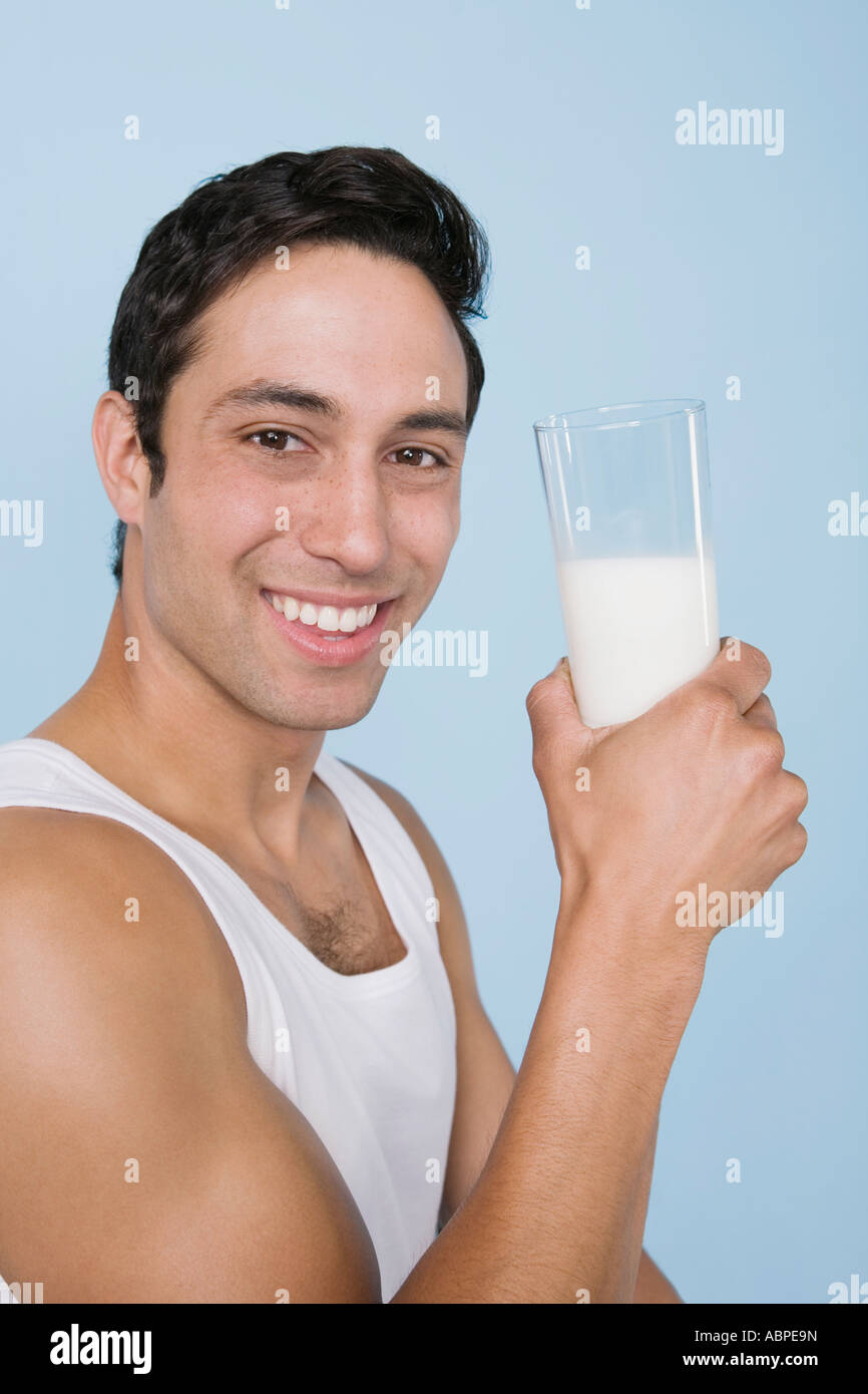 Man drinking glass of milk Stock Photo Alamy