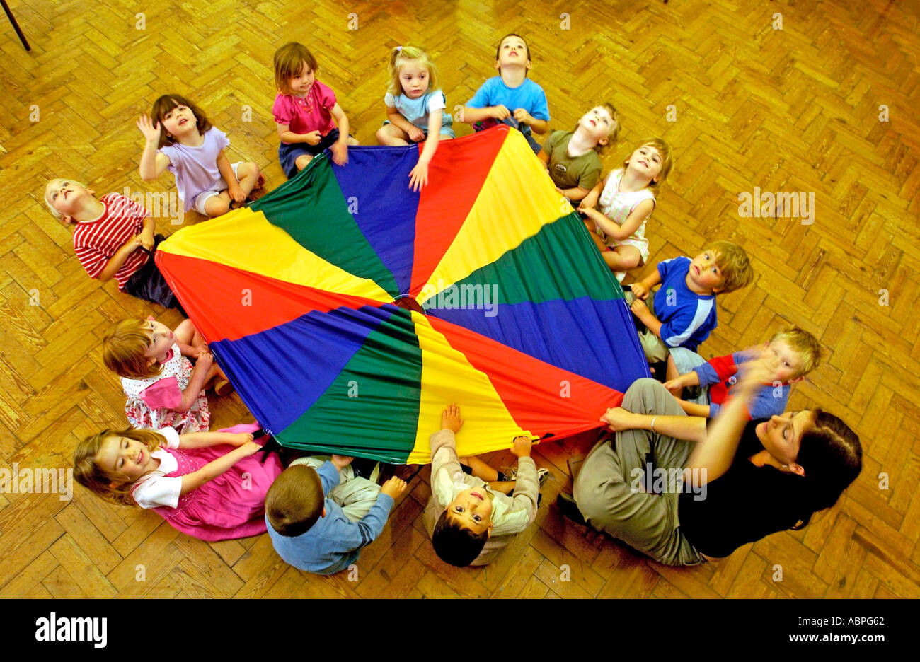 Montessori nursery school kids seen from above in their Brighton classroom Stock Photo