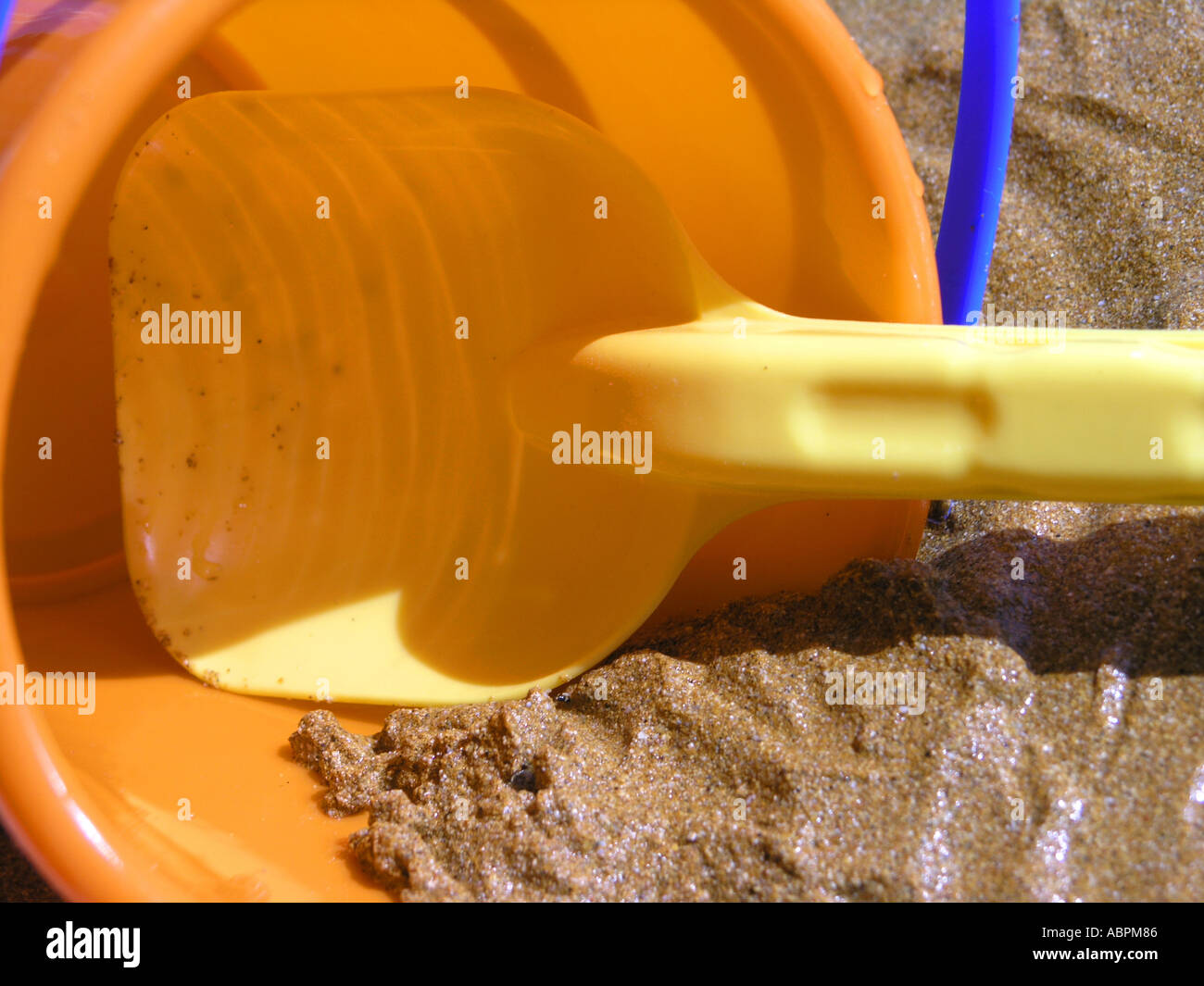 plastic bucket spade and sand on a beach Stock Photo Alamy