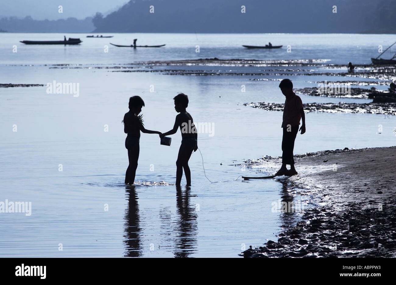 Lao children playing in river hi-res stock photography and images - Alamy