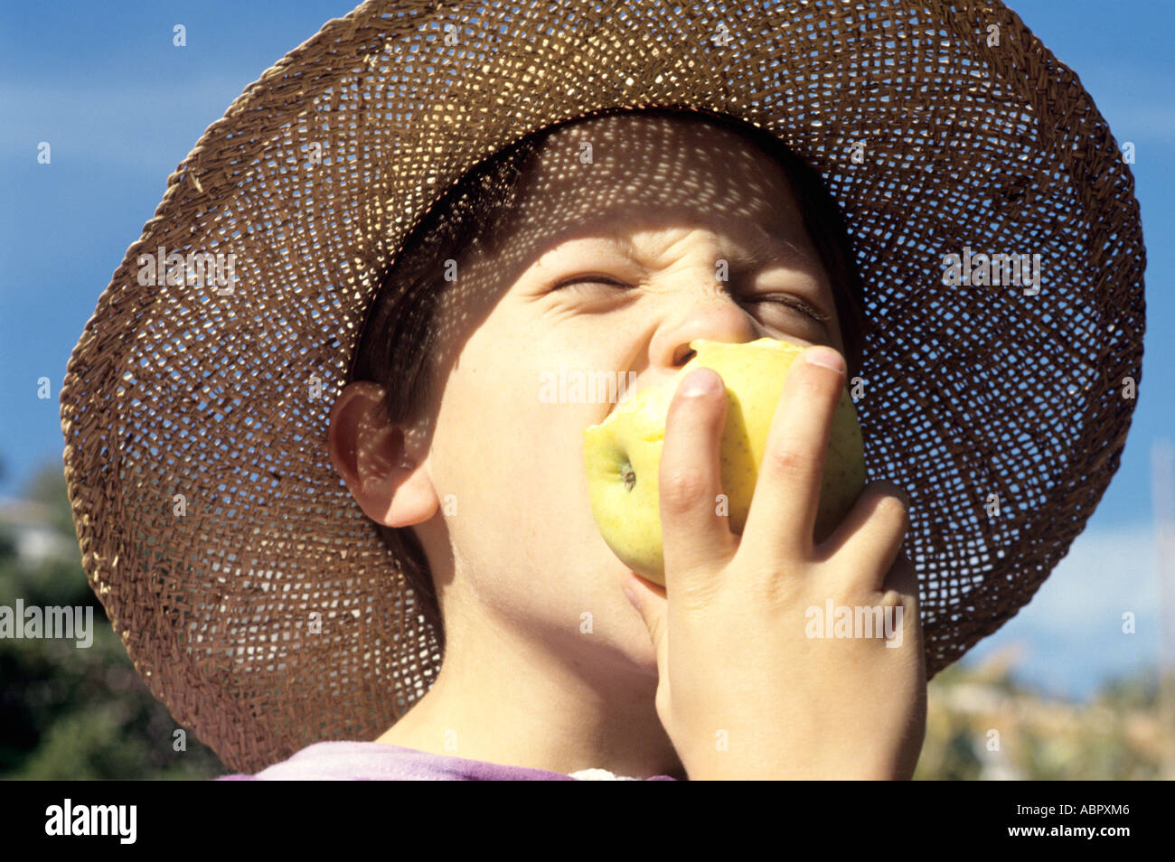 Enjoying an apple Stock Photo