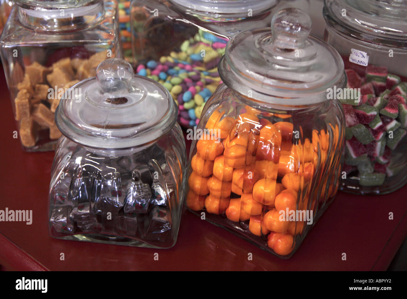 Boiled sweets in traditional glass jars Stock Photo
